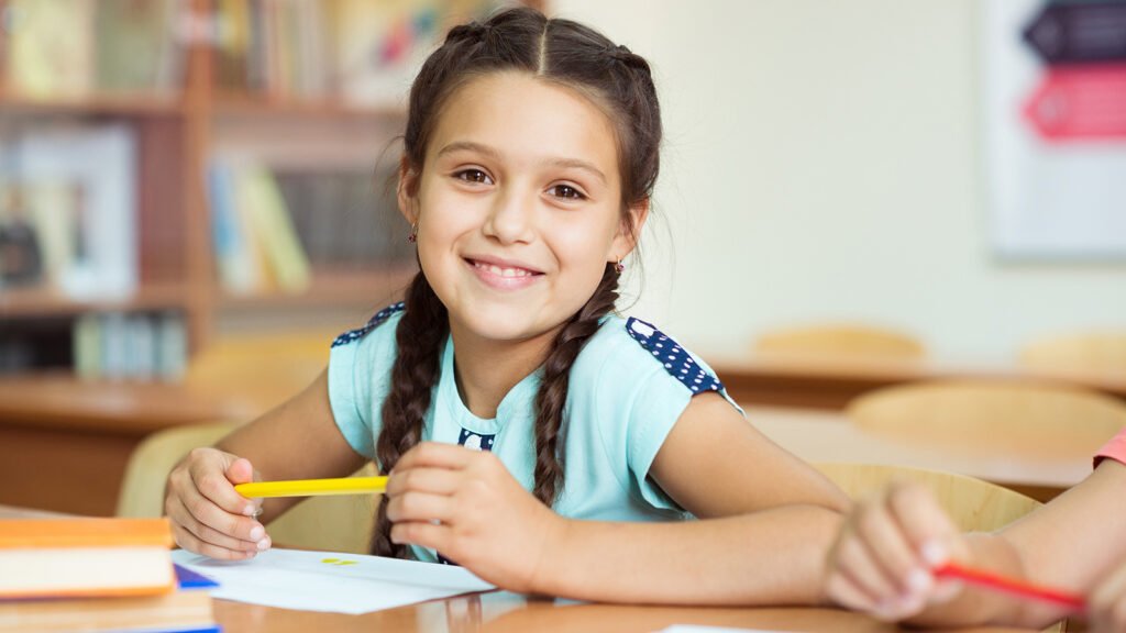 Confident student learning mathematics through personalised American Maths Tuition with Geopo Maths.